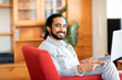 © Connect Images - Business manager using laptop
