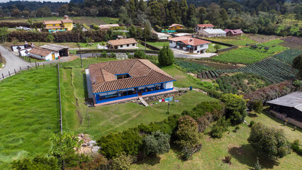 Wall Mural - 
Panoramic natural landscape corregimiento of Santa Elena Medellin - Colombia taken with a drone