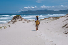 Cape Nature Walker Bay Beach Near Hermanus Western Cape South Africa. White Beach And Blue Sky With Clouds, Sand Dunes At The Beach In South Africa, Woman Walking At White Beach