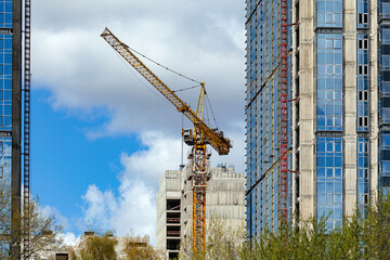 Tower crane on new buildings of the city.