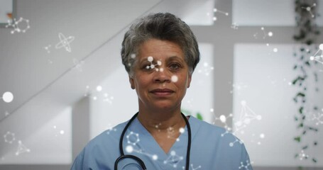 Sticker - Animation of shapes over african american female doctor