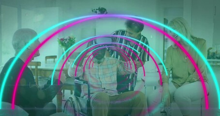 Sticker - Animation of circles over diverse group of seniors using vr headset