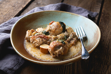 Canvas Print - Braised chicken legs with cream, spinach, garlic and smoked cheese