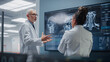 © Gorodenkoff - Medical Neuroscience Hospital Lab Meeting: Diverse Team of Neurosurgeon and Neurologist Analyze TV Screen Showing MRI Scan with Brain Images, Talk About Sick Patient Treatment Method, New Drugs Cure