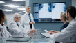© Gorodenkoff - Health Care Research Hospital Meeting Room: Female Physician Presents Patient X-ray on TV Screen, Team of Medical Doctors Discuss Treatment. Research Scientists Talk of Course of Cure, Drugs, Medicine