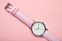 Pink Wrist Watches On Pink Background With Copy Space