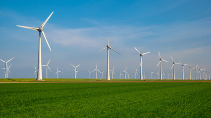 Wall Mural - Windmill farm in the ocean Westermeerwind park, windmills isolated at sea on a beautiful bright day Netherlands Flevoland Noordoostpolder. Huge windmill turbines