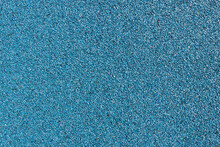 Rubber Coating For Playgrounds Applied On The Surface By A Steel Trowel. PDM Rubber Granules. Coating And Floor Covering For Sports. Rubber Mulch For Safety And Injury Prevention