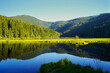 Beautiful Small Arber lake in the Bavarian Forest, Germany. View to mount Großer Arber.