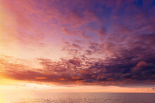 Elevated View Sea Ocean And Sunset Sunrise Sky Background With Cloudscape. Backdrop Sea Vacation Dreamy View.