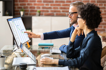 Poster - Businesspeople Analyzing Gantt Chart