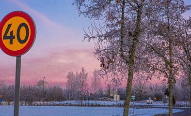 Wall Mural - 40 kilameters road sign in winter setting