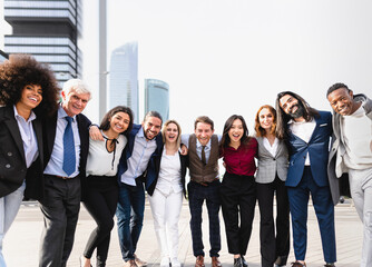 Wall Mural - Team of multiracial business people with different ages and ethnicities standing in the city center during meeting work