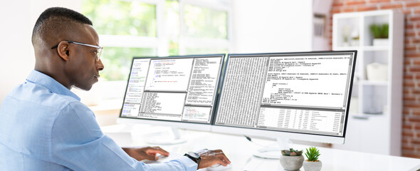 Poster - African American Coder Using Computer At Desk