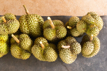 close up of pile fresh durian ready for harvest