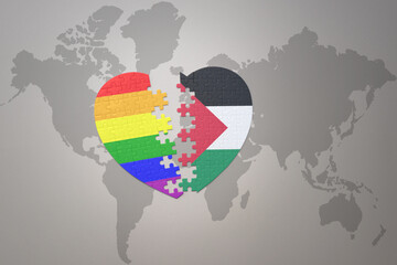 Wall Mural - puzzle heart with the rainbow gay flag and palestine on a world map background. Concept.
