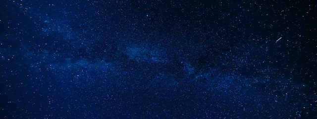 panorama of the night starry sky on the background of the milky way with many colorful shining stars