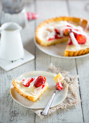 Sticker - Appetizing strawberry pie served in the morning for breakfast covered with white chocolate. Beautiful light still life with place for text. beautiful food