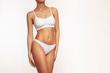 Woman body slim shape, fit female figure, waist, legs and abdomen in underwear