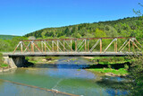 Fototapeta  - The rusty old bridge in Krempna, Low Beskids (Beskid Niski), Poland