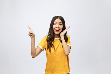 Wall Mural - Portrait of happy young asian woman with finger point up