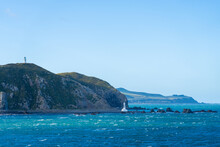 Pencarrow Heads Lighthouses And Coastal Scene When Leaving Wellington Harbour