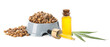 Dry pet food in bowl and bottle of hemp oil on white background