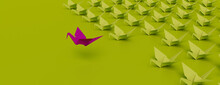 Success Concept With Origami Birds On A Green Background. 