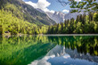 canvas print picture - Spiegelung am Lago di Fusine in Italien