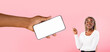 canvas print picture Black lady pointing at white empty smartphone screen, mockup