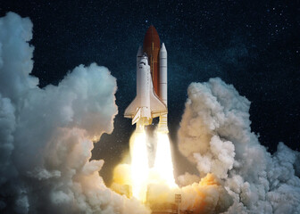 Poster - Spaceship with blast and clouds of smoke lift off into the starry blue sky. Successful launch of the space shuttle, the completion of a space mission. Rocket takeoff