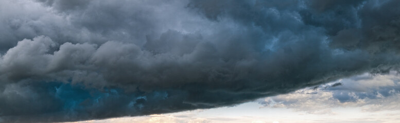 Canvas Print - dramatic cloudy sky with thunderstorm clouds. natural weather and climate sky panoramic background s