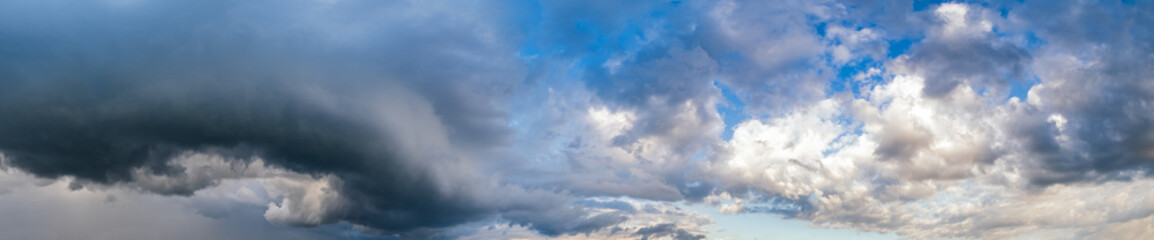 Canvas Print - dramatic cloudy sky with circular thunderstorm cloud. natural weather and climate sky panoramic back