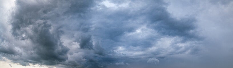 Canvas Print - dramatic cloudy sky with thunderstorm clouds. natural weather and climate sky panoramic background s
