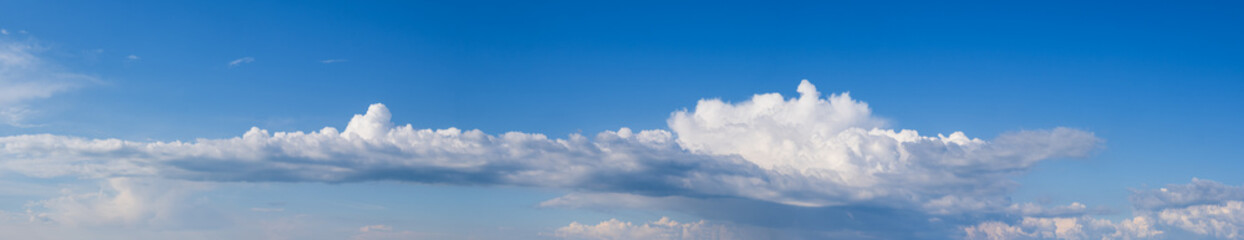 Canvas Print - white clouds in blue summer sky panoramic background