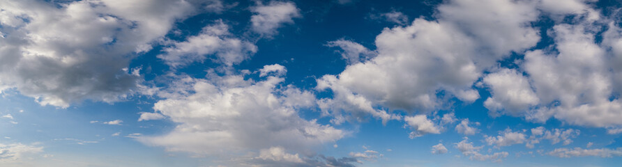 Canvas Print - white cumulus clouds in blue sky high resolution background
