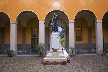 Sculpture in a courtyard of Pontifical College Gallio in Como, Italy