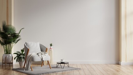 Modern minimalist interior with a gray armchair on empty white wall background.