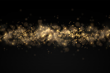 Sparkling golden magic dust particles bokeh light.
