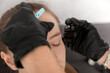 © somemeans - Beautician makes eyebrow correction to a young girl. Beautiful girl plucking her eyebrows. Close up.