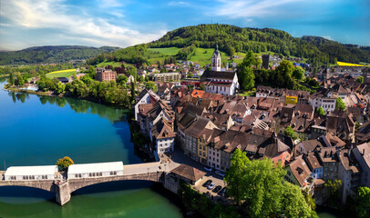 Wall Mural - Romantic beuatiful paces of Switzerland . Laufenburg town over Rhein river. popular tourist destination, border with Germany. Aerial panoramic view