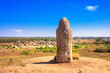 View of the ancient kurgan stela, stone idol against the backdrop of Kamyana Mohylain is an archaeological site in the Molochna River, Zaporizhzhia Oblast, Ukraine