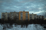 Fototapeta Nowy Jork - View of houses in winter. Cityscape. Yellow building.