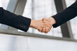 © anatoliycherkas - Two Businessmen Shaking Hands Outside Office
