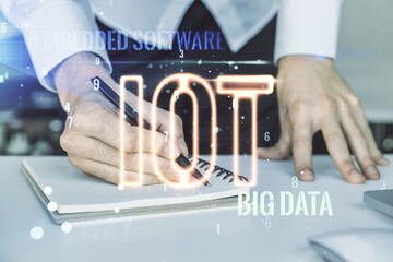 Poster - Creative IOT illustration with hand writing in diary on background with laptop, future technology concept. Multiexposure