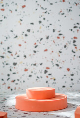 Poster - peach geometric pedestal on terrazzo background with summer sunlight