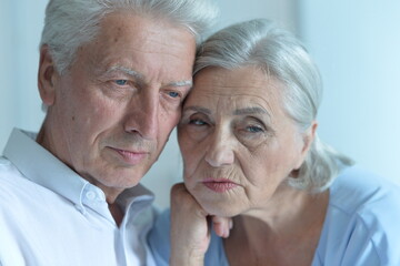 Sticker - Portrait of sad senior couple posing at home