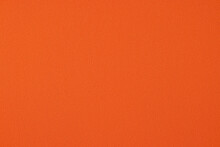 Orange Fabric Texture Background. Cotton Fabric Closeup
