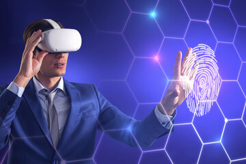 Poster - Attractive young european male with VR glasses on blue background with digital thumb print biometrics hexagonal hologram. Virtual reality, access and experience concept. Double exposure.