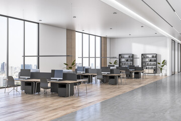 Poster - Side view on modern interior design coworking office with comfortable work places rows, wooden and concrete floor, light ceiling and city view from big windows. 3D rendering